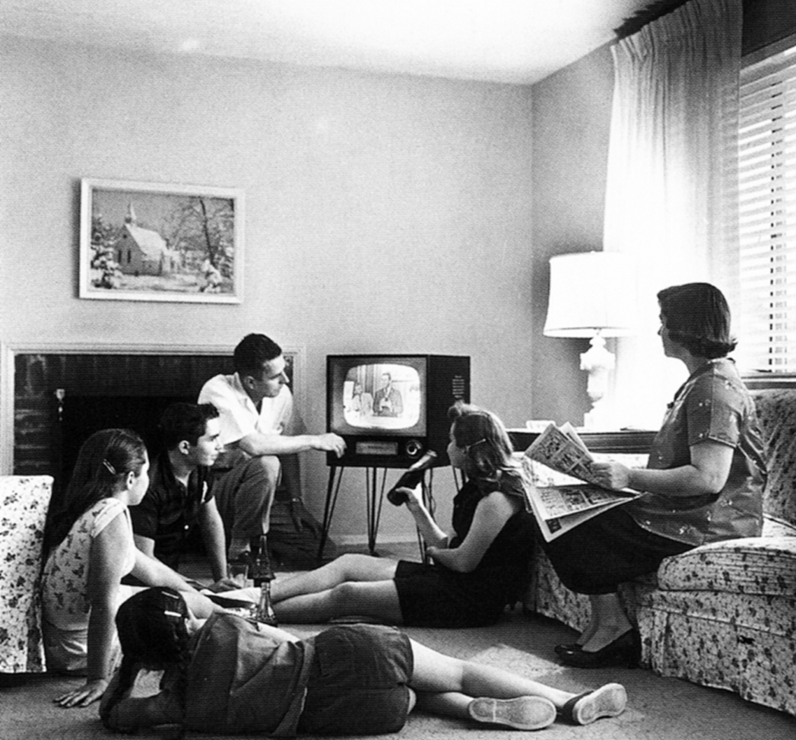 American family watching TV, 1950s